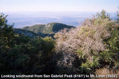 View southwest toward Mt. Lowe in the foreground, and beyond, the LA skyline, Palisades Peninsula, Catalina and other Channel Islands, and the vast Pacific Ocean.